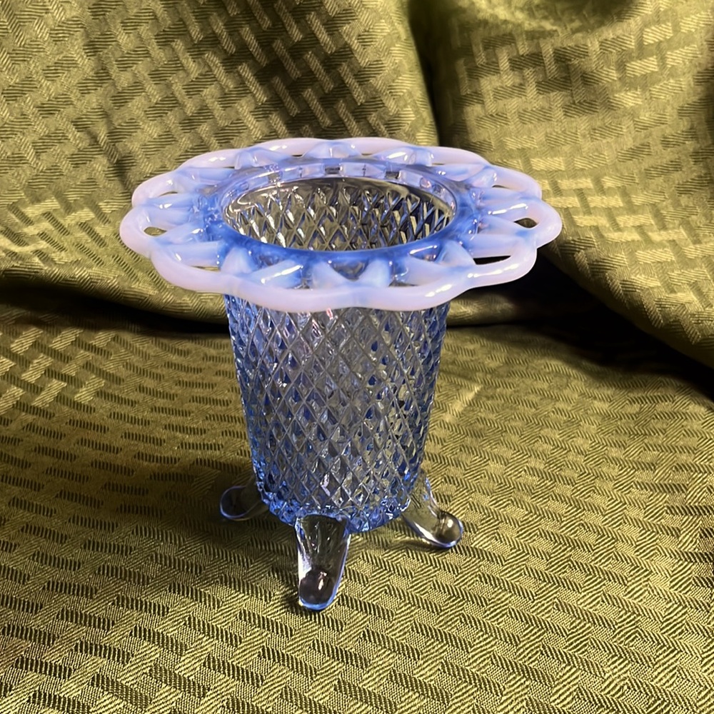 Vintage imperial glass blue vase with opalescent edges. Four legged diamond cut.